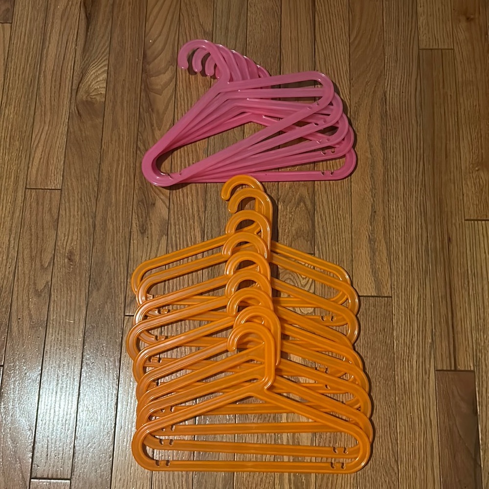 IKEA Children’s hangers. 9 orange 5 pink. Total of 14. Excellent condition.